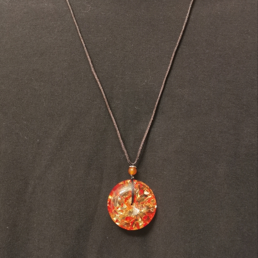Long necklace, like amber pendent.